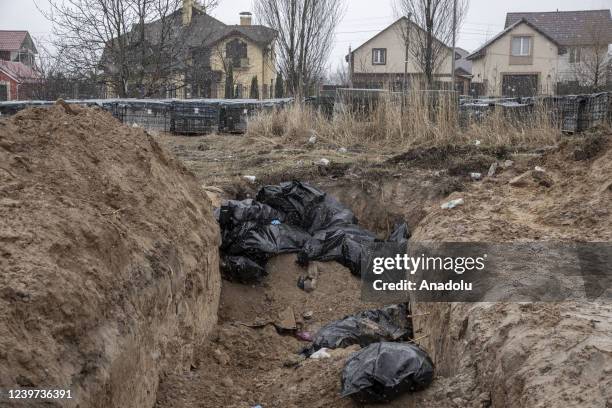 Bodies of civilians are seen in a mass grave in the town of Bucha, on the outskirts of Kyiv, after the Ukrainian army secured the area following the...