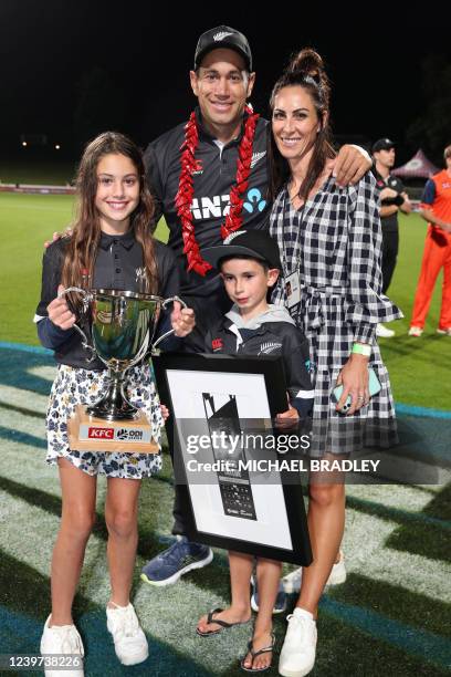 New Zealand's Ross Taylor poses with his wife Victoria Brown and children Mackenzie and Jonty, after his last match for New Zealand during the third...
