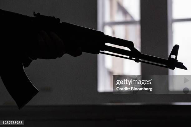 Participant practices handling a Kalashnikov assault rifle during a firearms training session in Lviv, Ukraine, on Saturday, April 2, 2022. The...