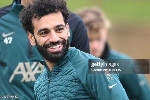 Liverpool's Egyptian midfielder Mohamed Salah reacts during a training session at the Liverpool FC training ground in Liverpool, north west England,...