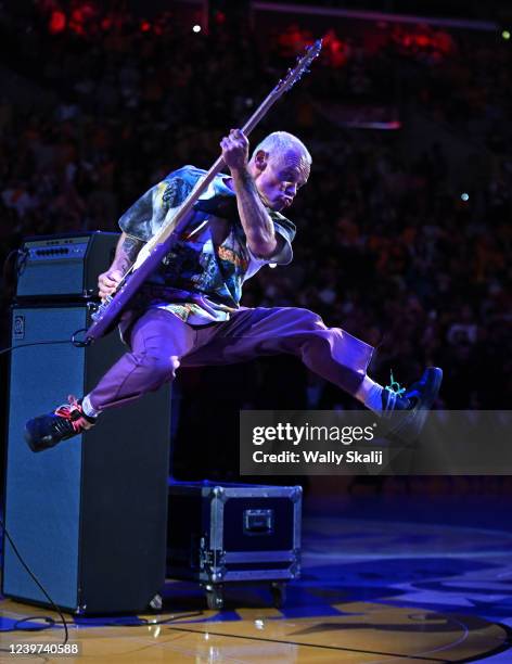 Los Angeles, California April 3, 2022- Red hot Chili Peppers guitarist Flea performs the National Anthem before a Lakers and Nuggets game at...