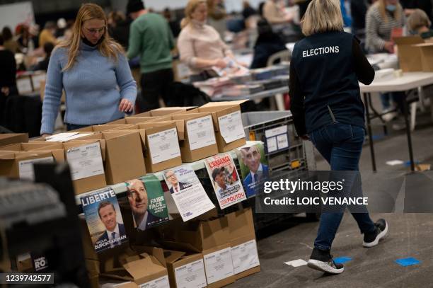 Hundreds of public servants prepare election propaganda to get mailed to citizens, less than a week ahead of the first round of the presidential...