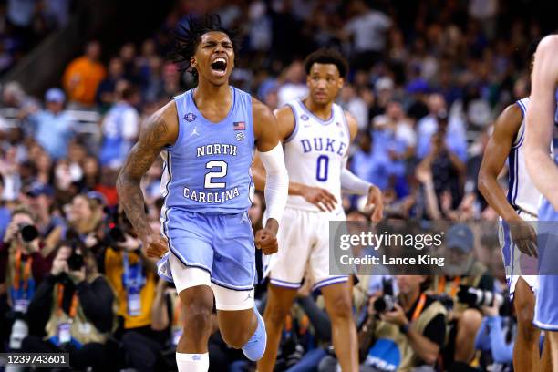 Caleb Love of the North Carolina Tar Heels reacts against the Duke Blue Devils during the 2022 NCAA Men's Basketball Tournament Final Four semifinal...