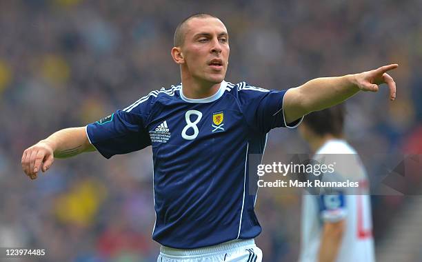 Scott Brown of Scotland in action during the UEFA EURO 2012 Group I Qualifying match between Scotland and Czech Republic at Hampden Park on September...