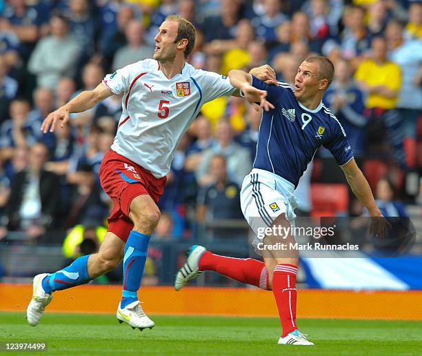 Kenny Miller of Scotland in action against Roman Hubnik of Czech Republic during the UEFA EURO 2012 Group I Qualifying match between Scotland and...