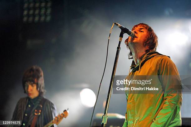 Gem Archer and Liam Gallagher of Beady Eye perform on stage at Lowlands Festival on August 21, 2011 in Biddinghuizen, Netherlands.