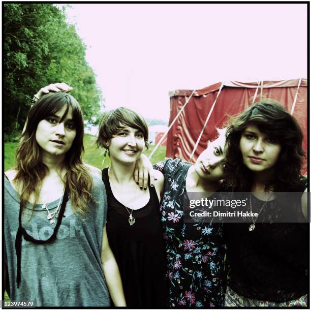 Theresa Wayman, Emily Kokal, Jenny Lee Lindberg and Stella Mozgawa of Warpaint pose backstage at Lowlands Festival on August 21, 2011 in...