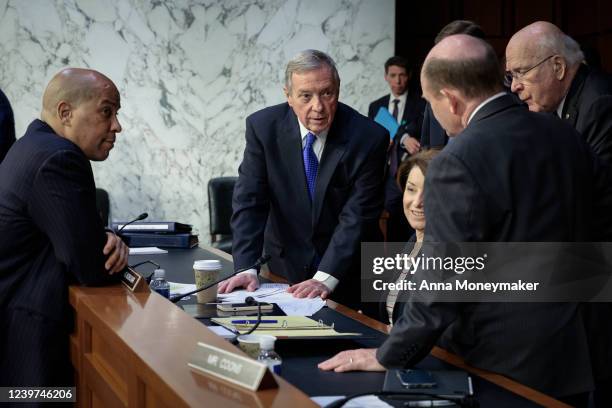 Sen. Cory Booker , committee chairman Sen. Dick Durbin , Sen. Amy Klobuchar , Sen. Chris Coons and Sen. Patrick Leahy speak with each other during a...