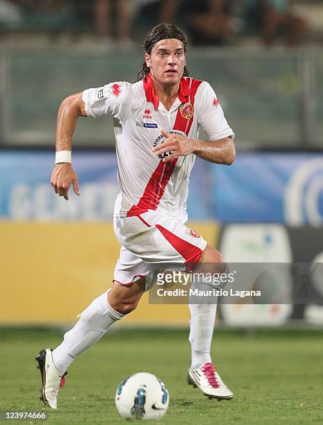 Federico Gerardi of Grosseto runs with the ball during the Serie B match between Reggina Calcio and US Grosseto FC at Stadio Oreste Granillo on...