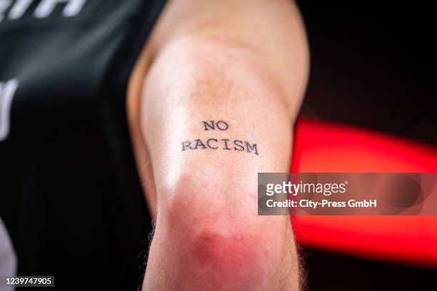 No Racism Tattoo during the Basketball Bundesliga match between ALBA Berlin and Medi Bayreuth on April 4, 2022 in Berlin, Germany.