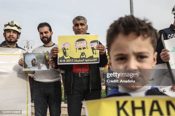 Syrians stage a protest against Assad regime forces' chemical gas attack on April 4, 2017 on Khan Shaykhun town, in Idlib, Syria on April 4, 2022.