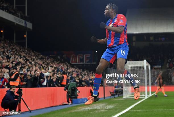 Crystal Palace's French-born striker Jean-Philippe Mateta celebrates scoring the opening goal during the English Premier League football match...