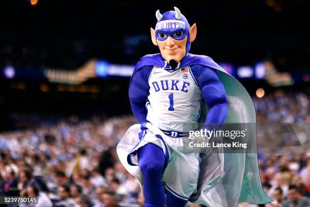 The mascot of the Duke Blue Devils performs against the North Carolina Tar Heels during the 2022 NCAA Men's Basketball Tournament Final Four...