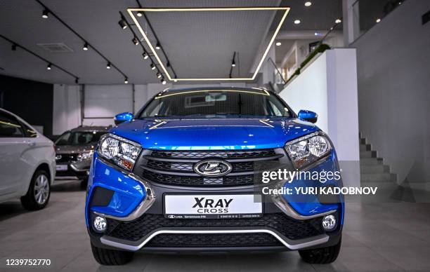 Lada Xray automobile is on display at a Lada car dealership showroom in Tolyatti, also known as Togliatti, on April 1, 2022. For generations the...