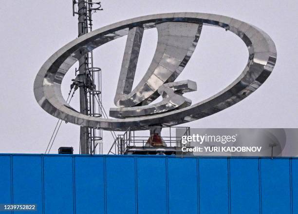 The emblem of the Avtovaz automobile plant sits on the roof of the plant's administration building in Tolyatti, also known as Togliatti, on March 31,...