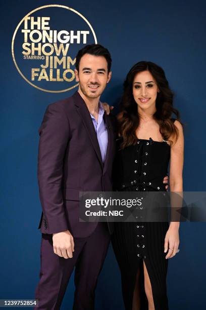 Episode 1629 -- Pictured: Authors Kevin Jonas and Danielle Jonas pose backstage on Monday, April 4, 2022 --