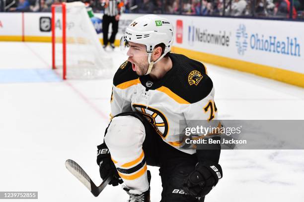 Jake DeBrusk of the Boston Bruins celebrates his overtime game-winning goal against the Columbus Blue Jackets at Nationwide Arena on April 4, 2022 in...