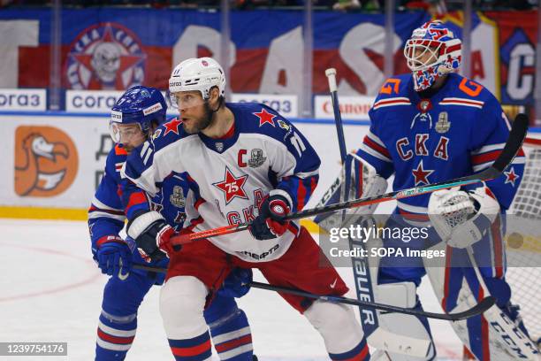 Hockey Club player, Lars Johansson , Oscar Fantenberg and CSKA Hockey Club player, Sergey Andronov seen in action during the Kontinental Hockey...