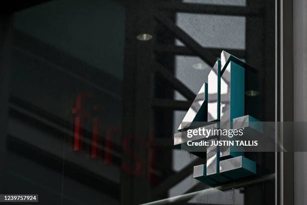 Photograph taken on April 5, 2022 shows the logo of Channel 4 at the TV network headquarters in London, as Britain's government plans to privatise...