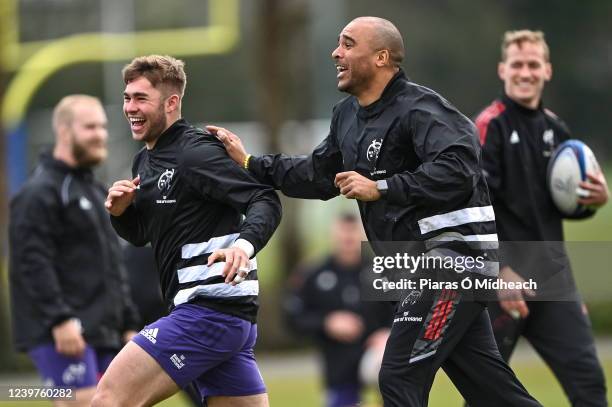 Limerick , Ireland - 5 April 2022; Simon Zebo with Jack Crowley, left, during Munster rugby squad training at University of Limerick in Limerick.