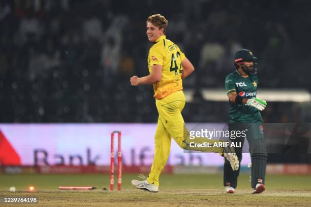 Australia's Cameron Green celebrates after taking the wicket of Pakistan's Mohammad Rizwan during the Twenty20 international cricket match between...