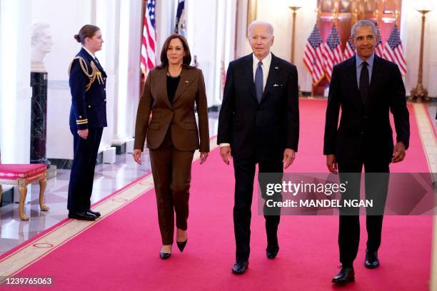 Vice President Kamala Harris, US President Joe Biden, and former President Barack Obama arrive to deliver remarks on the Affordable Care Act and...