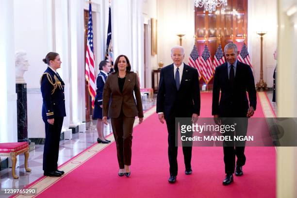 Vice President Kamala Harris, US President Joe Biden, and former President Barack Obama arrive to deliver remarks on the Affordable Care Act and...