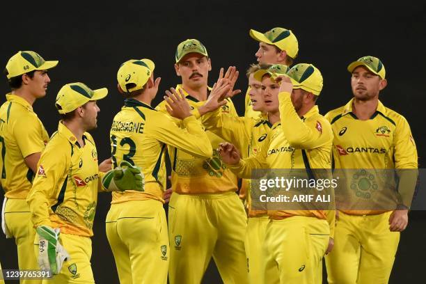 Australia's players celebrate after the dismissal of Pakistan's Asif Ali during the Twenty20 international cricket match between Pakistan and...