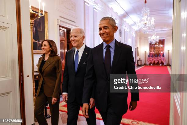 Vice President Kamala Harris, former President Barack Obama, and U.S. President Joe Biden arrive for an event to mark the 2010 passage of the...