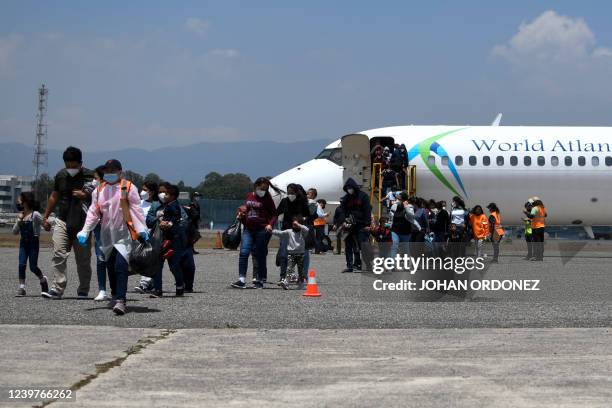 Guatemalan migrants deported from the US arrive to the Air Force Base in Guatemala City, on April 5,2022.