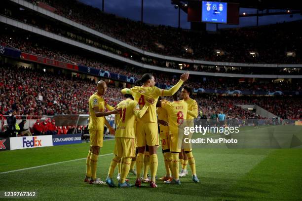 Ibrahima Konate of Liverpool FC celebrates with teammates after scoring during the UEFA Champions League Quarter Final Leg One football match between...