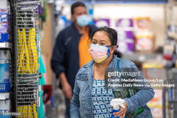 Panorama City, CA Shoppers continue to wear masks while shopping at Walmart in Panorama City on Thursday, March 3, 2022. The CDCs new COVID 19...