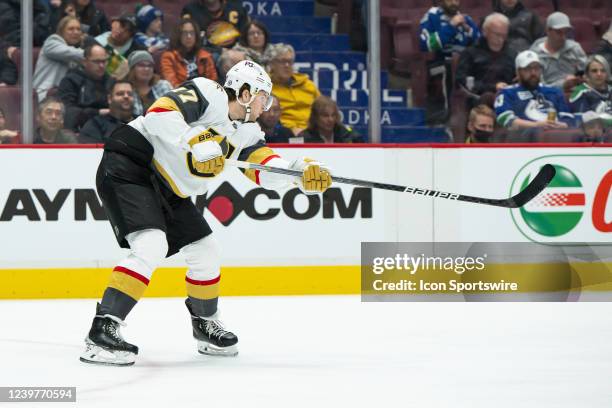 Vegas Golden Knights defenseman Ben Hutton passes the puck during their NHL game against the Vancouver Canucks at Rogers Arena on April 3, 2022 in...