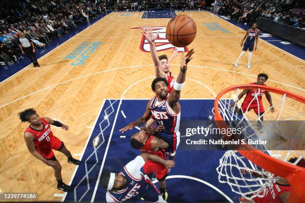 Kyrie Irving of the Brooklyn Nets shoots the ball during the game against the Houston Rockets on April 5, 2022 at Barclays Center in Brooklyn, New...