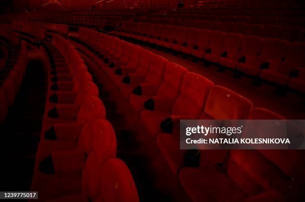 Empty seats are pictured in a screening room of the Oktyabr cinema in Moscow on March 29, 2022. - Five Hollywood giants -- Disney, Universal, Sony...