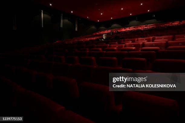 Few people are pictured in a screening room of the Oktyabr cinema in Moscow on March 29, 2022. - Five Hollywood giants -- Disney, Universal, Sony...