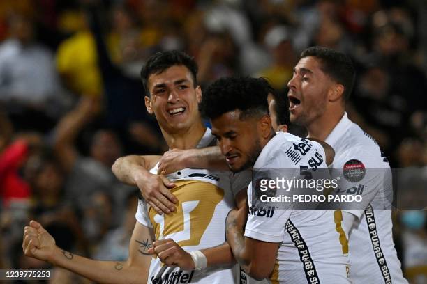 Pumas' Argentinian forward Juan Dinenno celebrates after scoring against Cruz Azul during their first leg semi-final CONCACAF Champions League...