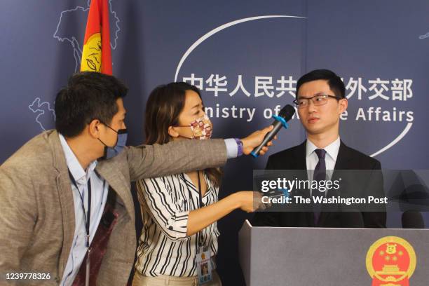 The EyeCTVs Chen Tzu-chien, right, and the Bailingguo News Kylie Wang and Ken Young, are the faces of Taiwans next generation of political satirists...