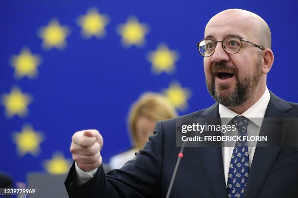 European Council President Charles Michel gestures as he speaks during a debate on the conclusions of the European Council meeting regarding Russian...