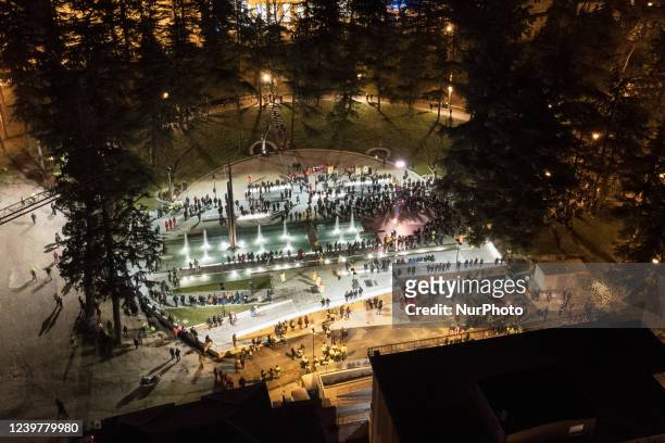 Aerial drone view of Parco della Memoria ceremony and a light beam shining during ceremony of 13th anniversary of earthquake in L'Aquila, Italy, on...