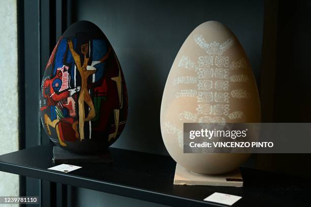 Photograph taken on April 6, 2022 shows an Easter chocolate egg inspired by Picasso's 1925 "The Three Dancers" and Givenchy's 2013 "Bolero", made by...