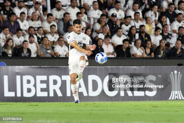 Ivan Torres of Olimpia kicks the ball during a match between Olimpia and Cerro Porteño as part of Copa CONMEBOL Libertadores 2022 at Estadio...