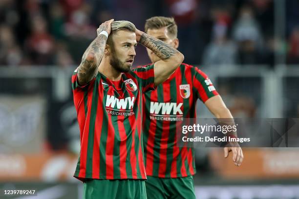 Niklas Dorsch of FC Augsburg gestures during the Bundesliga match between FC Augsburg and 1. FSV Mainz 05 at WWK-Arena on April 06, 2022 in Augsburg,...