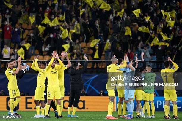 Villareal's players celebrate at the end of during the UEFA Champions League quarter final first leg football match between Villarreal CF and Bayern...