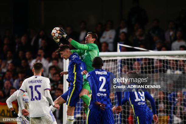 Real Madrid's Belgian goalkeeper Thibaut Courtois catches the ball during the UEFA Champions League Quarter-final first leg football match between...