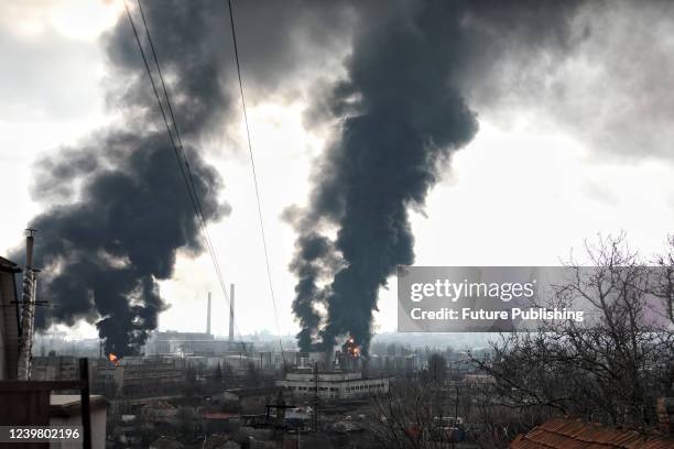 The pillars of smoke rise above the territory of an oil refinery and an oil depot hit by Russian rockets, Odesa, southern Ukraine.