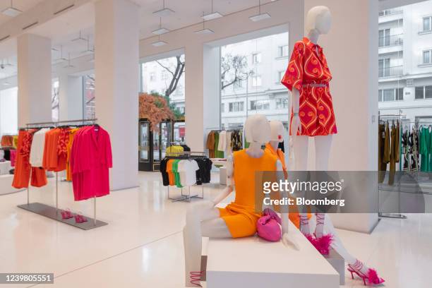 Mannequins display summer dresses in the womenswear department inside the new Zara flagship store, operated by Inditex SA, at Plaza de Espana in...