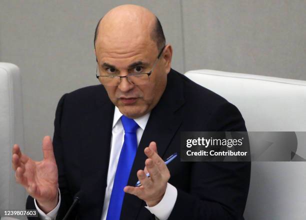 Russian Prime Minister Mikhail Mishustin speaks during the session of the Duma on April 7, 2022 in Moscow, Russia. Russia's Prime Minster presented...
