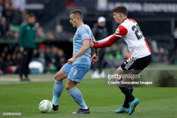 Tomas Holes of Slavia Praha, Guus Til of Feyenoord during the Conference League match between Feyenoord v Slavia Prague at the Stadium Feijenoord on...