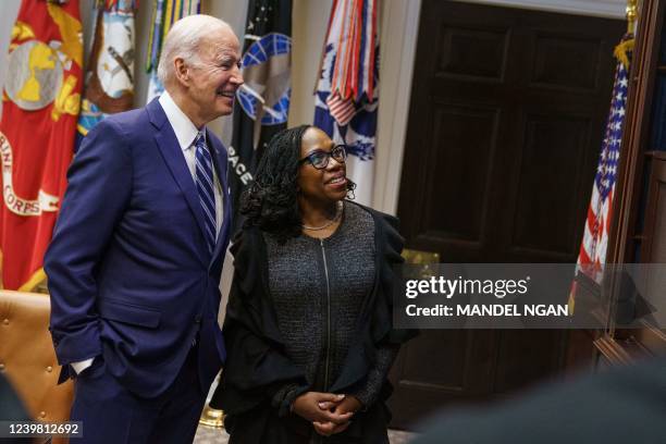 President Joe Biden and Judge Ketanji Brown Jackson watch the Senate vote on her nomination to be an associate justice on the US Supreme Court, from...